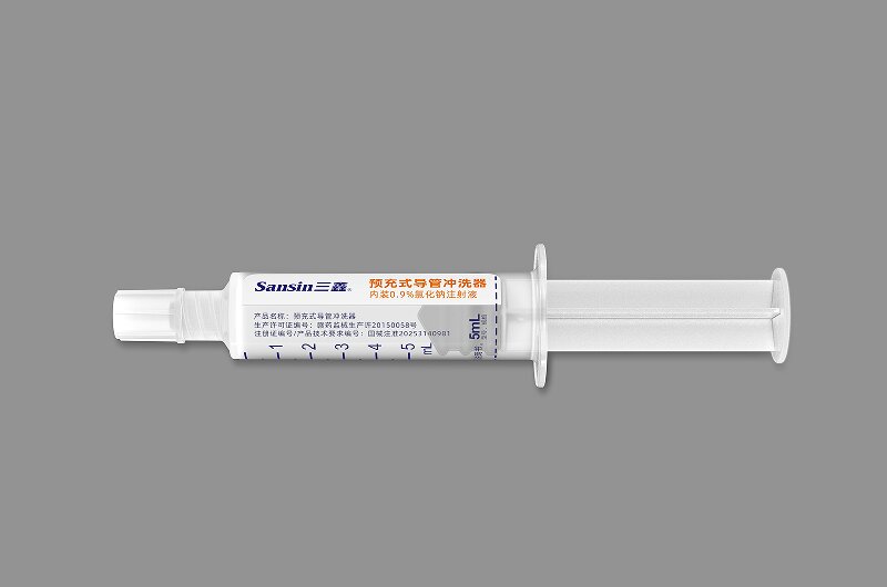 Pre filled catheter flushing device